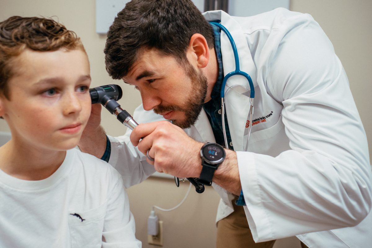 AFC provider examining child for allergy symptoms